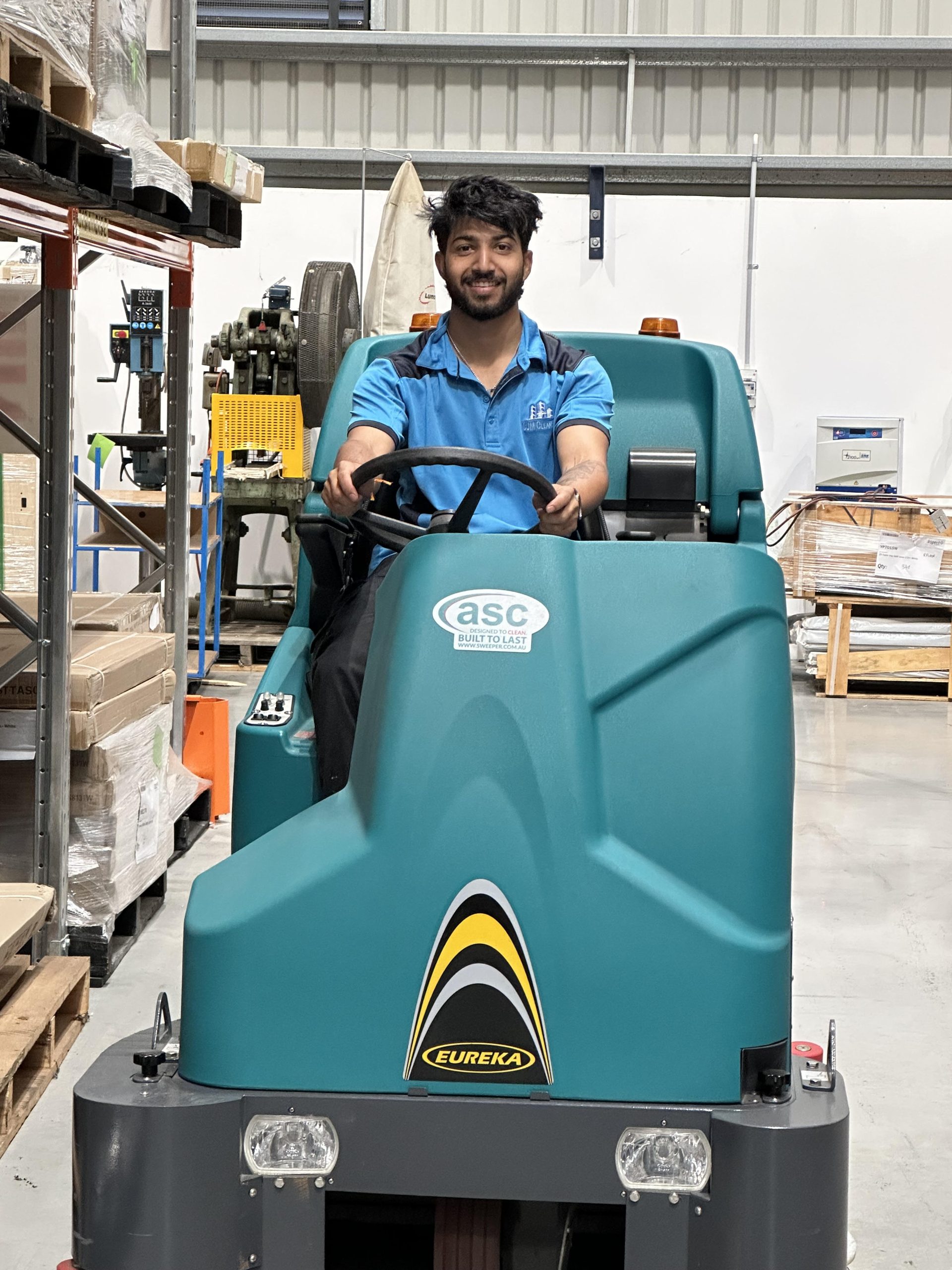 CJM cleaner operating warehouse cleaning equipment