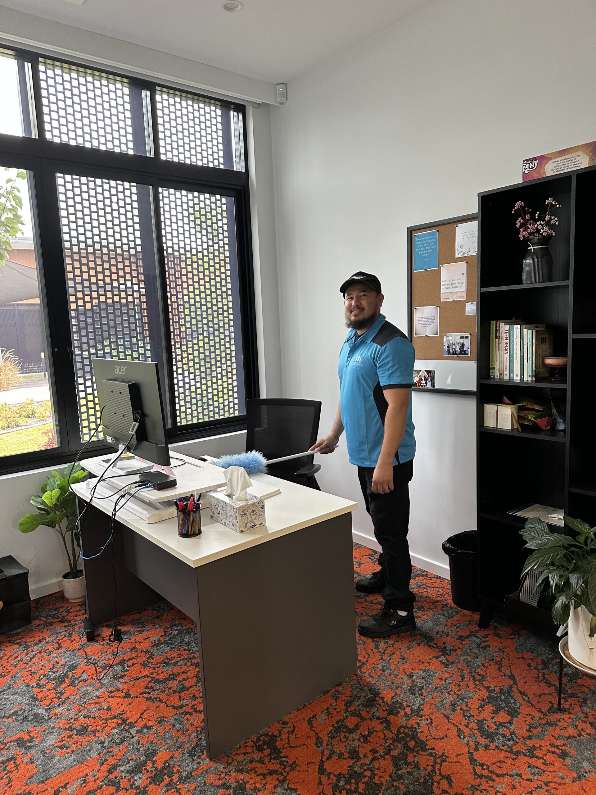 CJM cleaner working in an office